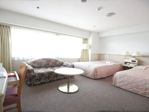 Imagen de la habitación del Hotel The Gotembakan. Foto 26