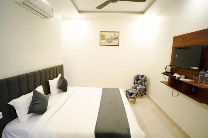 Imagen de la habitación del Hotel The Govind palace. Foto 5
