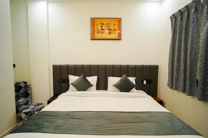 Imagen de la habitación del Hotel The Govind palace. Foto 8
