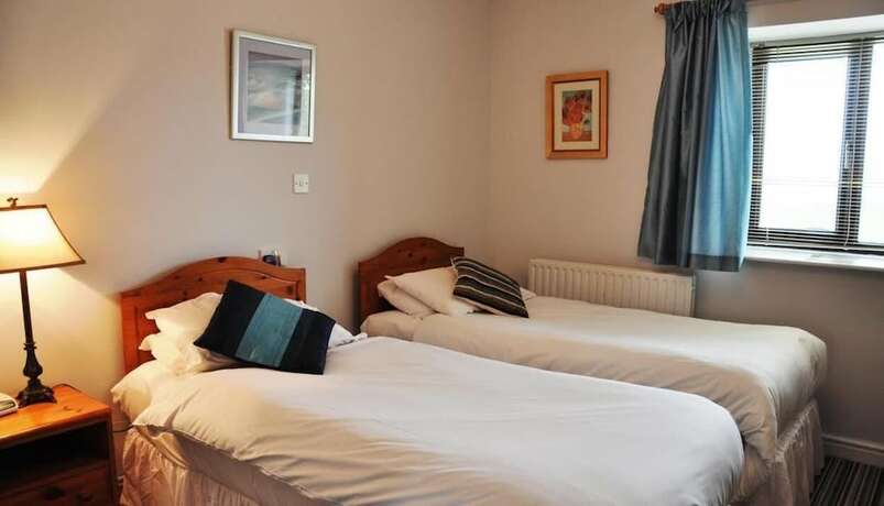 Imagen de la habitación del Hotel The Gower Golf Club. Foto 20