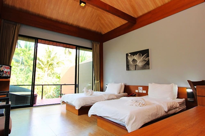 Imagen de la habitación del Hotel The Grace Amphawa Resort. Foto 1