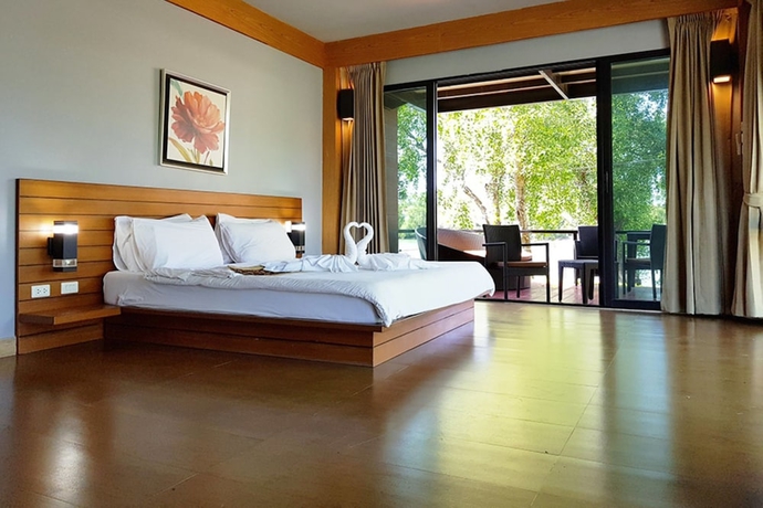 Imagen de la habitación del Hotel The Grace Amphawa Resort. Foto 6