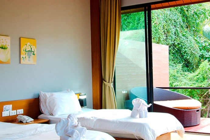 Imagen de la habitación del Hotel The Grace Amphawa Resort. Foto 14