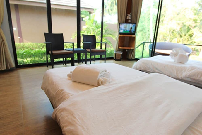 Imagen de la habitación del Hotel The Grace Amphawa Resort. Foto 18