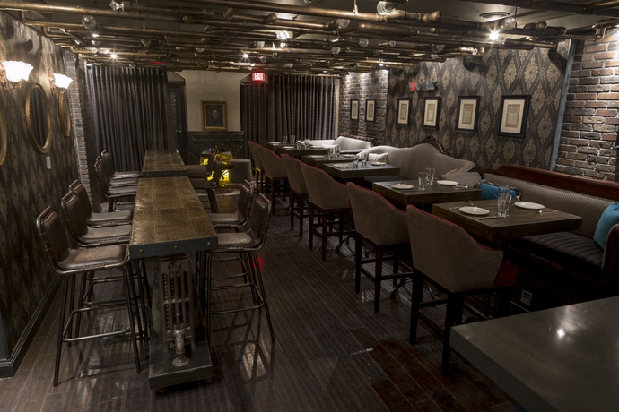 Imagen del bar/restaurante del Hotel The Graham Georgetown. Foto 3
