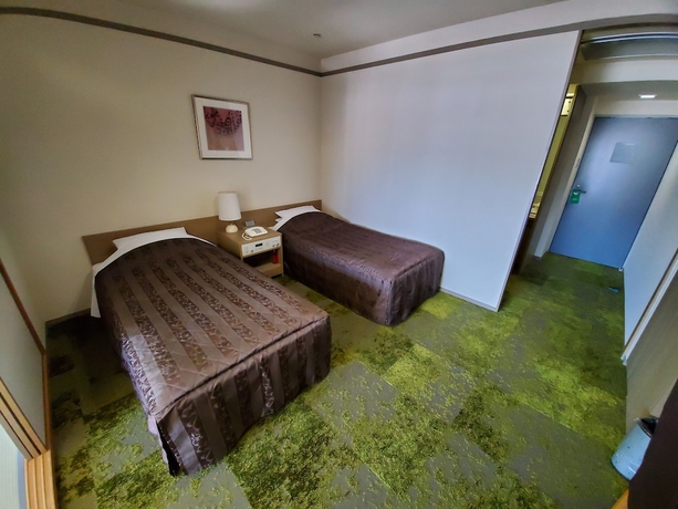 Imagen de la habitación del Hotel The Gran Resort Elegante Kyoto. Foto 11