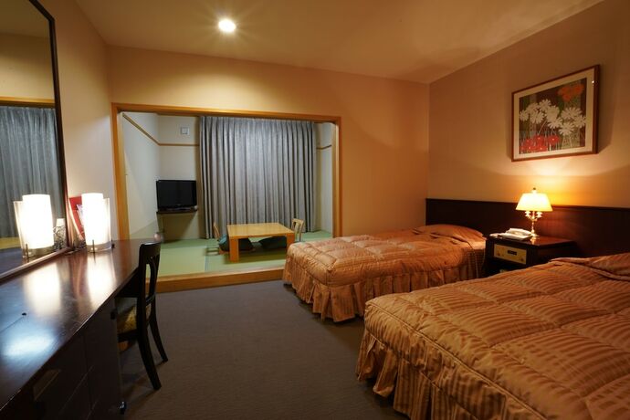 Imagen de la habitación del Hotel The Gran Resort Ohmimaiko. Foto 32