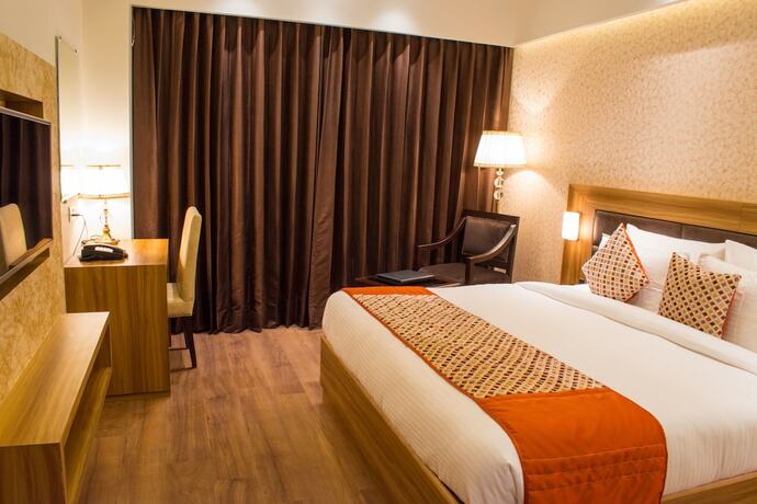 Imagen de la habitación del Hotel The Grand Ambassador. Foto 15