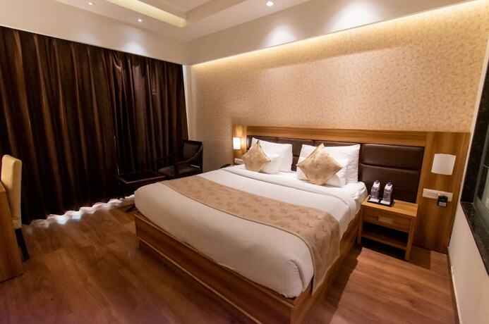 Imagen de la habitación del Hotel The Grand Ambassador. Foto 17