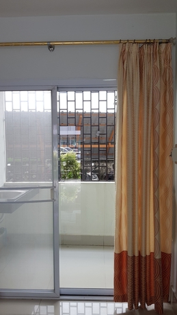 Imagen de la habitación del Hotel The Grand Apartment. Foto 6