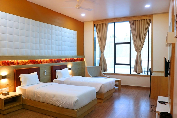 Imagen de la habitación del Hotel The Grand Astoria Somnath. Foto 6