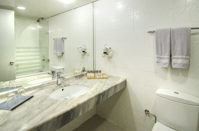 Imagen de la habitación del Hotel The Grand Blue Sky International. Foto 6