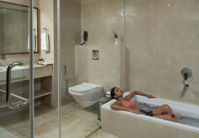 Imagen de la habitación del Hotel The Grand Cliff Resort Munnar. Foto 11