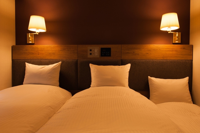 Imagen de la habitación del Hotel The Grand Court Tsunishi. Foto 8