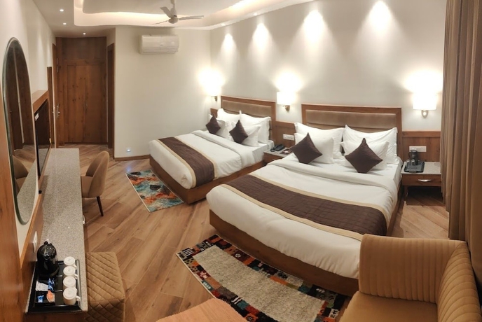 Imagen de la habitación del Hotel The Grand Dewan. Foto 4