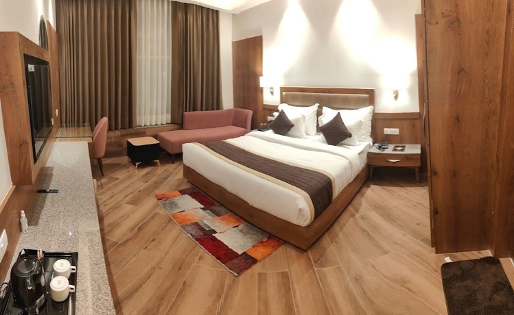 Imagen de la habitación del Hotel The Grand Dewan. Foto 6