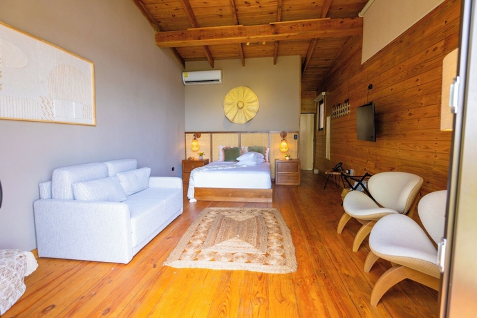Imagen de la habitación del Hotel The Grand Forest Jarabacoa. Foto 2