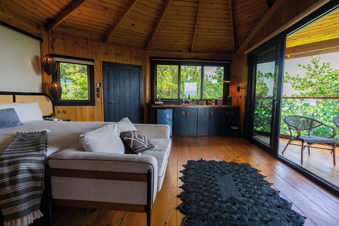 Imagen de la habitación del Hotel The Grand Forest Jarabacoa. Foto 15
