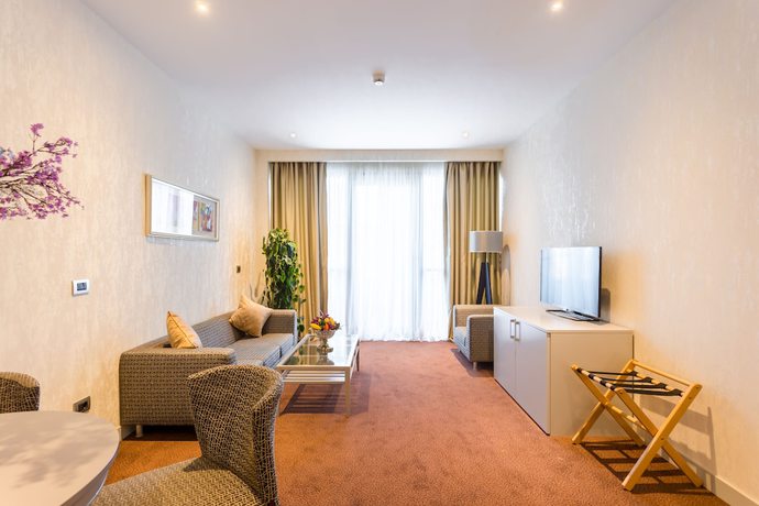 Imagen de la habitación del Hotel The Grand Gloria. Foto 6