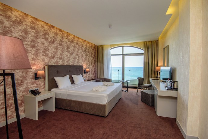 Imagen de la habitación del Hotel The Grand Gloria. Foto 16