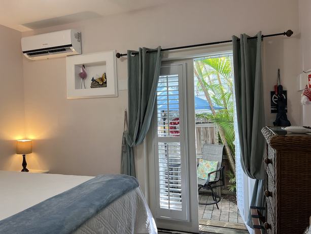 Imagen de la habitación del Hotel The Grand Guesthouse. Foto 4