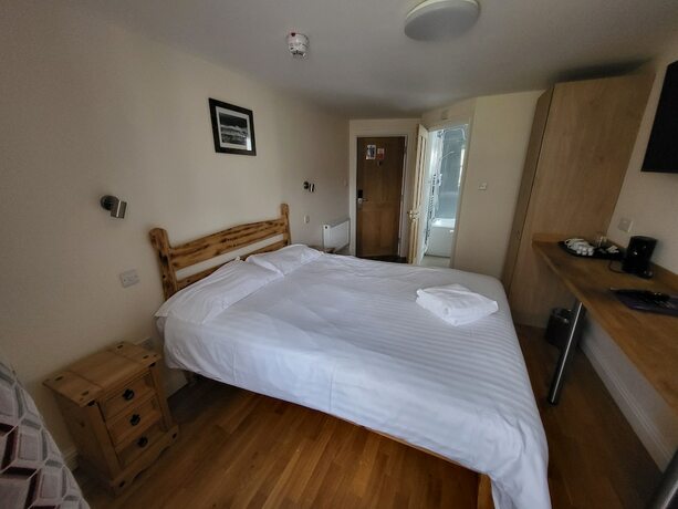 Imagen de la habitación del Hotel The Grand Harbour. Foto 12