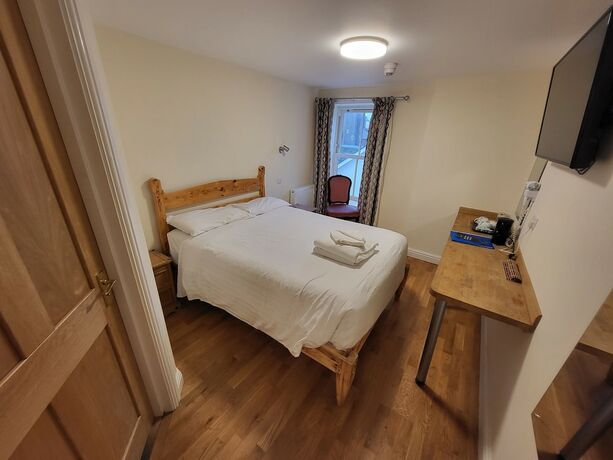 Imagen de la habitación del Hotel The Grand Harbour. Foto 13