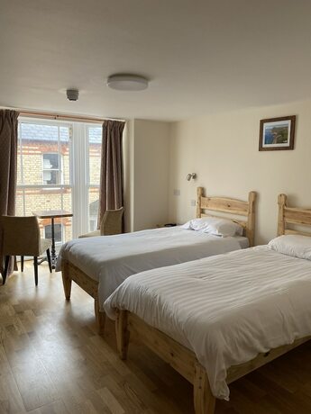 Imagen de la habitación del Hotel The Grand Harbour. Foto 14