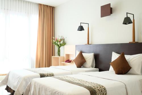 Imagen de la habitación del Hotel The Grand Hill Resort-Hotel. Foto 15