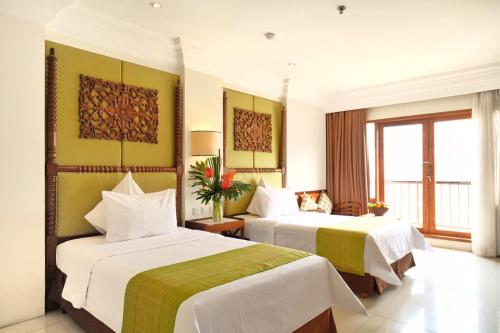 Imagen de la habitación del Hotel The Grand Hill Resort-Hotel. Foto 16