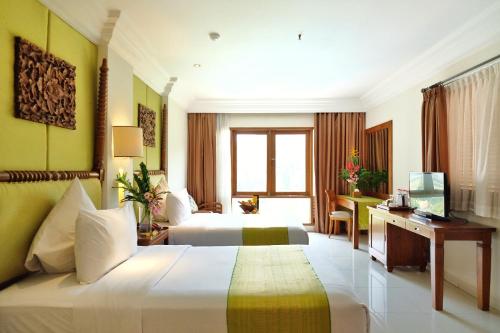 Imagen de la habitación del Hotel The Grand Hill Resort-Hotel. Foto 19