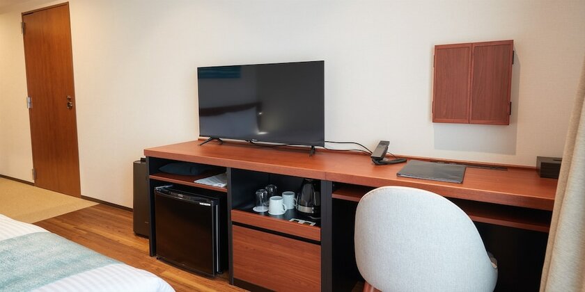 Imagen de la habitación del Hotel The Grand Hotel Ginowan. Foto 16