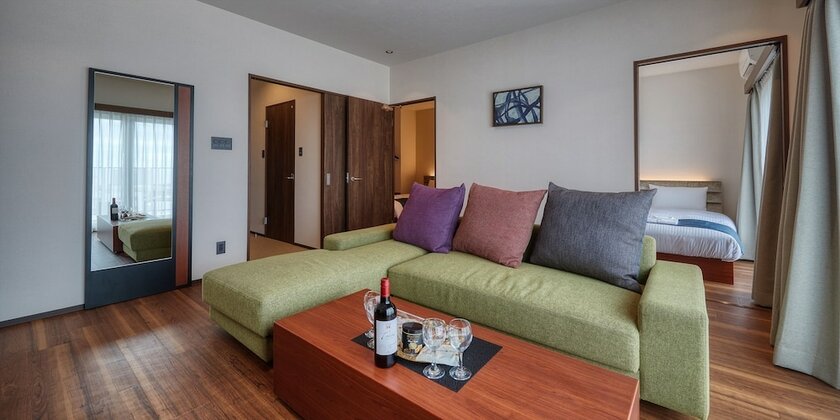 Imagen de la habitación del Hotel The Grand Hotel Ginowan. Foto 18