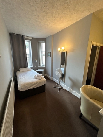 Imagen de la habitación del Hotel The Grand Hotel, Port Talbot. Foto 14