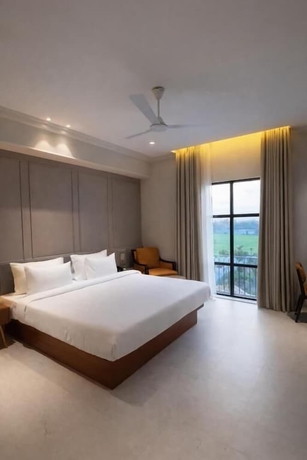 Imagen de la habitación del Hotel The Grand Jalsa Resort. Foto 7