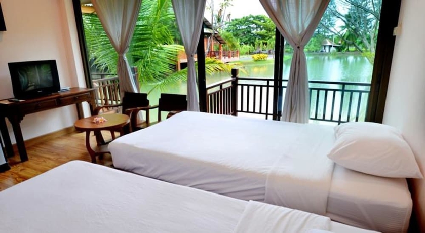 Imagen de la habitación del Hotel The Grand Jamjuree Resort Lamphun. Foto 2