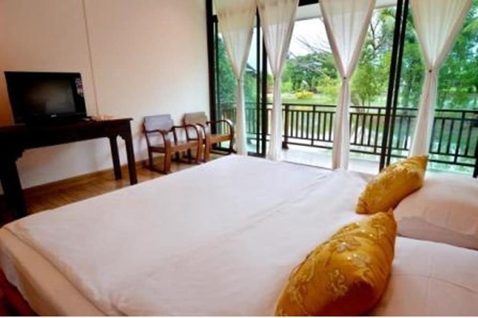 Imagen de la habitación del Hotel The Grand Jamjuree Resort Lamphun. Foto 6