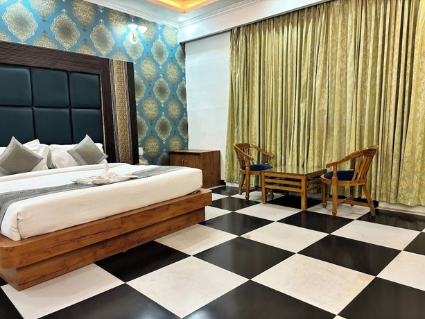 Imagen de la habitación del Hotel The Grand Kasturi Resort. Foto 11