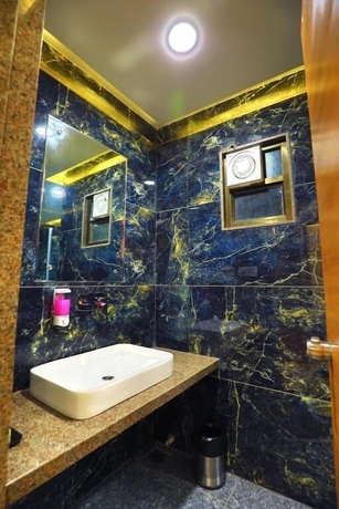 Imagen de la habitación del Hotel The Grand Ladhukara. Foto 17