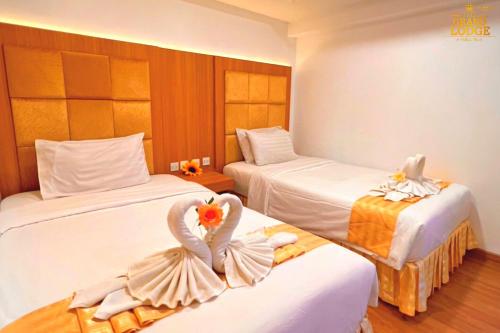 Imagen de la habitación del Hotel The Grand Lodge Pattaya. Foto 14
