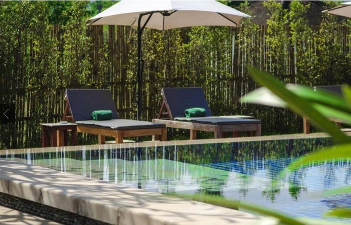 Imagen de la piscina del Hotel The Grand Luang Prabang. Foto 14