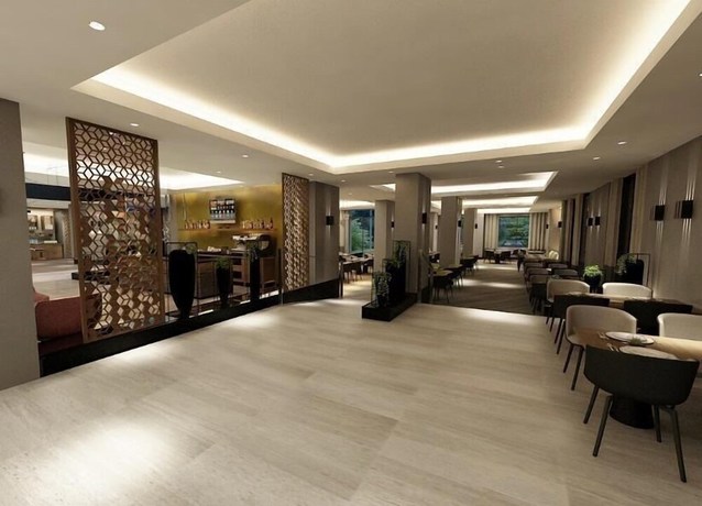 Imagen del bar/restaurante del Hotel The Grand Lux. Foto 2