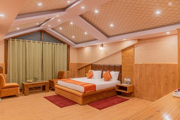 Imagen de la habitación del Hotel The Grand Madhushala Shimla. Foto 3