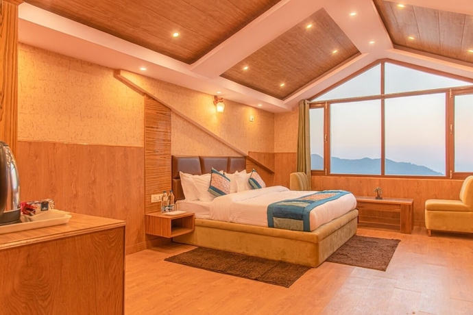 Imagen de la habitación del Hotel The Grand Madhushala Shimla. Foto 4