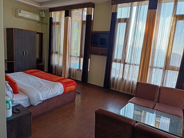 Imagen de la habitación del Hotel The Grand Madhushala Shimla. Foto 5
