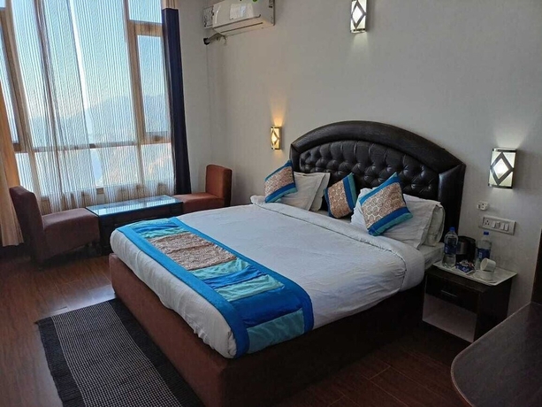 Imagen de la habitación del Hotel The Grand Madhushala Shimla. Foto 9