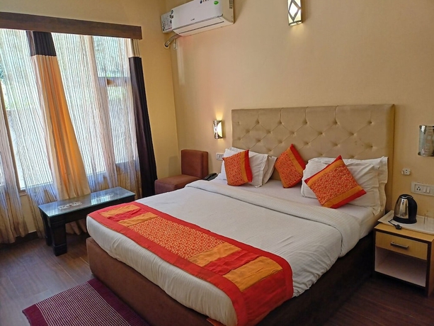 Imagen de la habitación del Hotel The Grand Madhushala Shimla. Foto 11