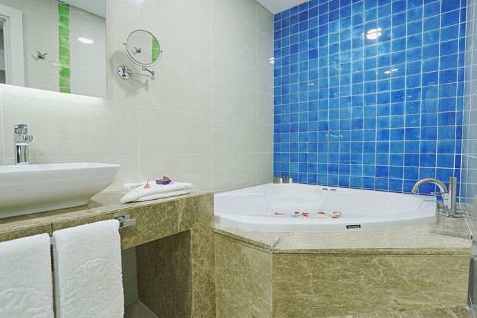 Imagen de la habitación del Hotel The Grand Mira. Foto 7