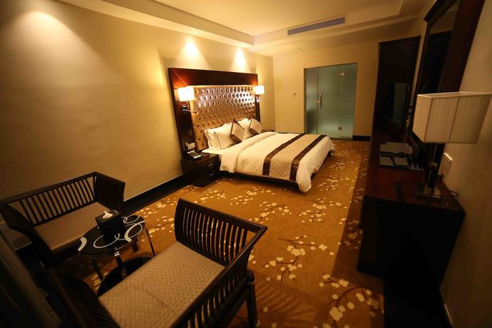 Imagen de la habitación del Hotel The Grand Mountain. Foto 11