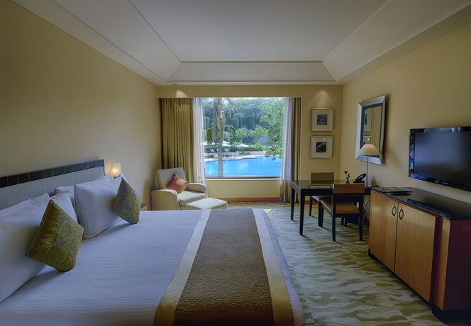 Imagen de la habitación del Hotel The Grand New Delhi. Foto 5